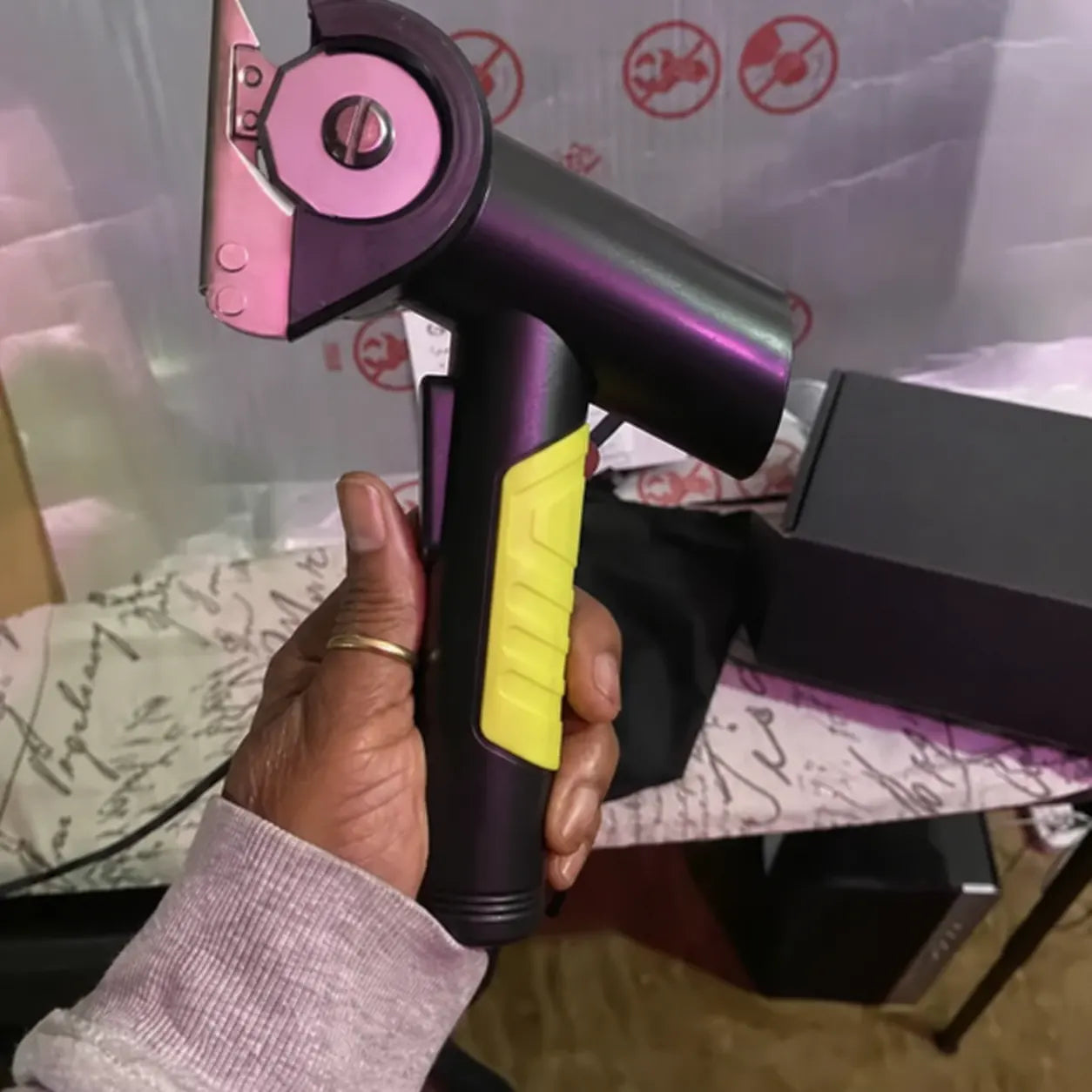 Buyer holding the electric scissors