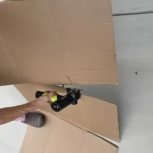 Buyer cutting cardboard