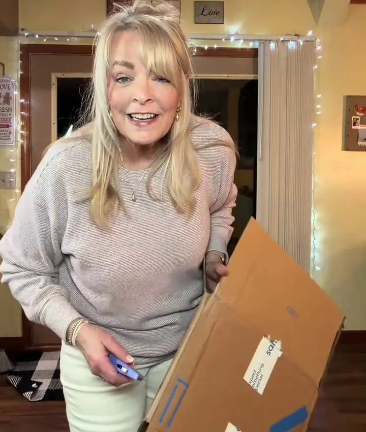 Utility knife cutting cardboard